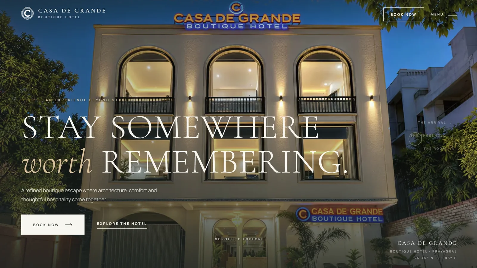 Casa De Grande website hero showing the illuminated arched hotel façade at dusk with the headline ‘Stay somewhere worth remembering.’